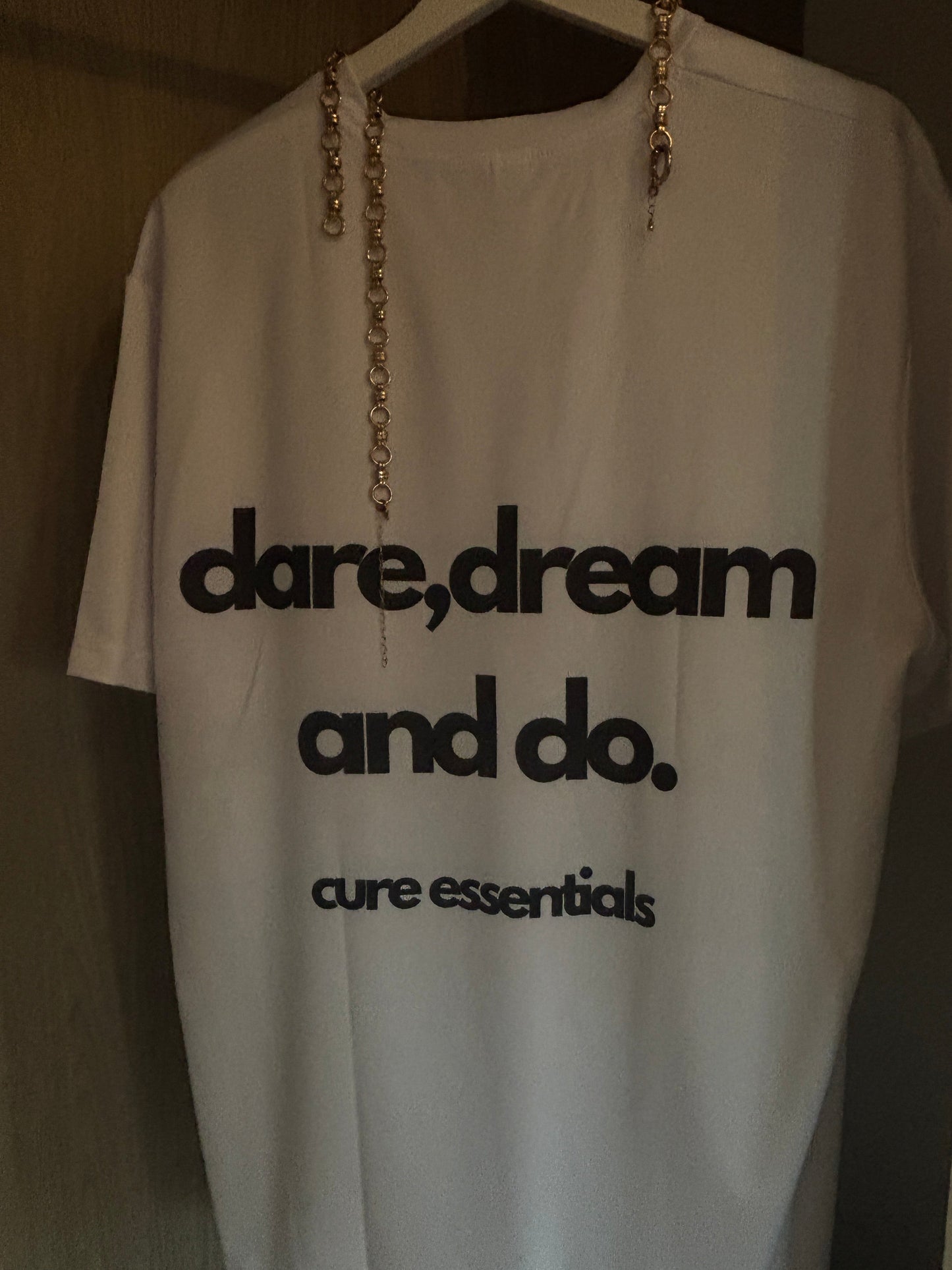 dare, dream and do. white cure essentials shirt -95%polyester 5%spandex